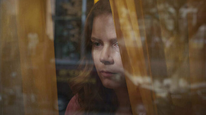 La mujer en la ventana
